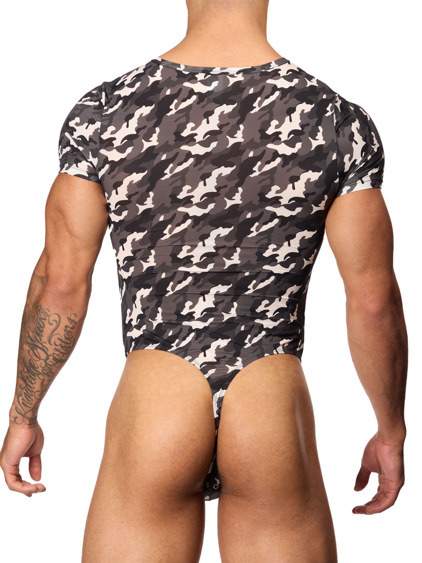 Rear view of a male model wearing a black and white camouflage bodysuit with short-sleeves