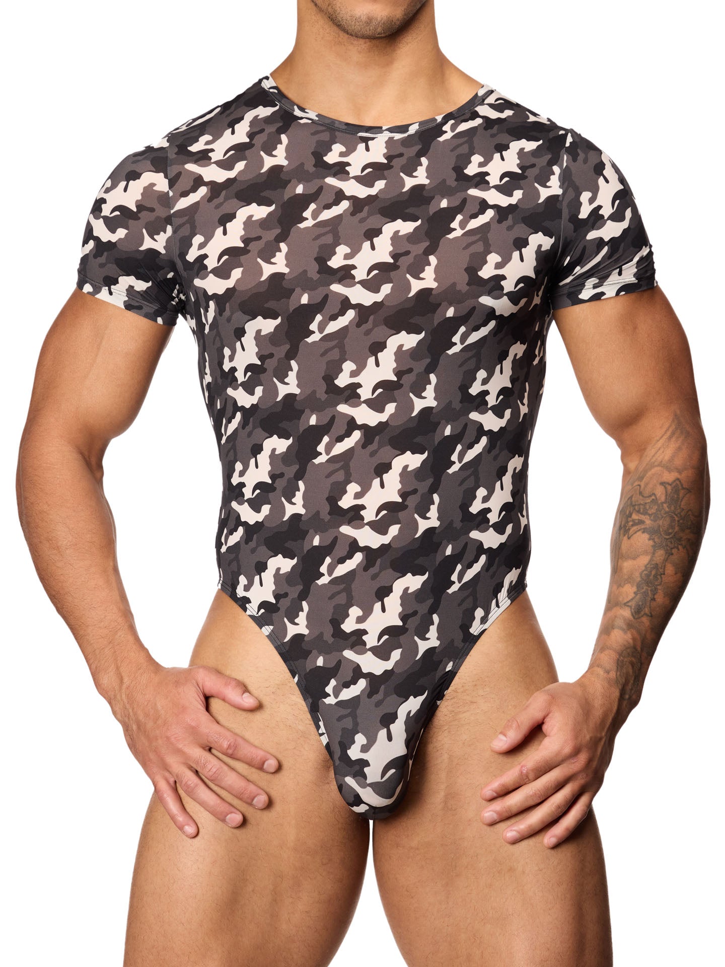 Front view of a male model wearing a black and white camouflage bodysuit with short-sleeves