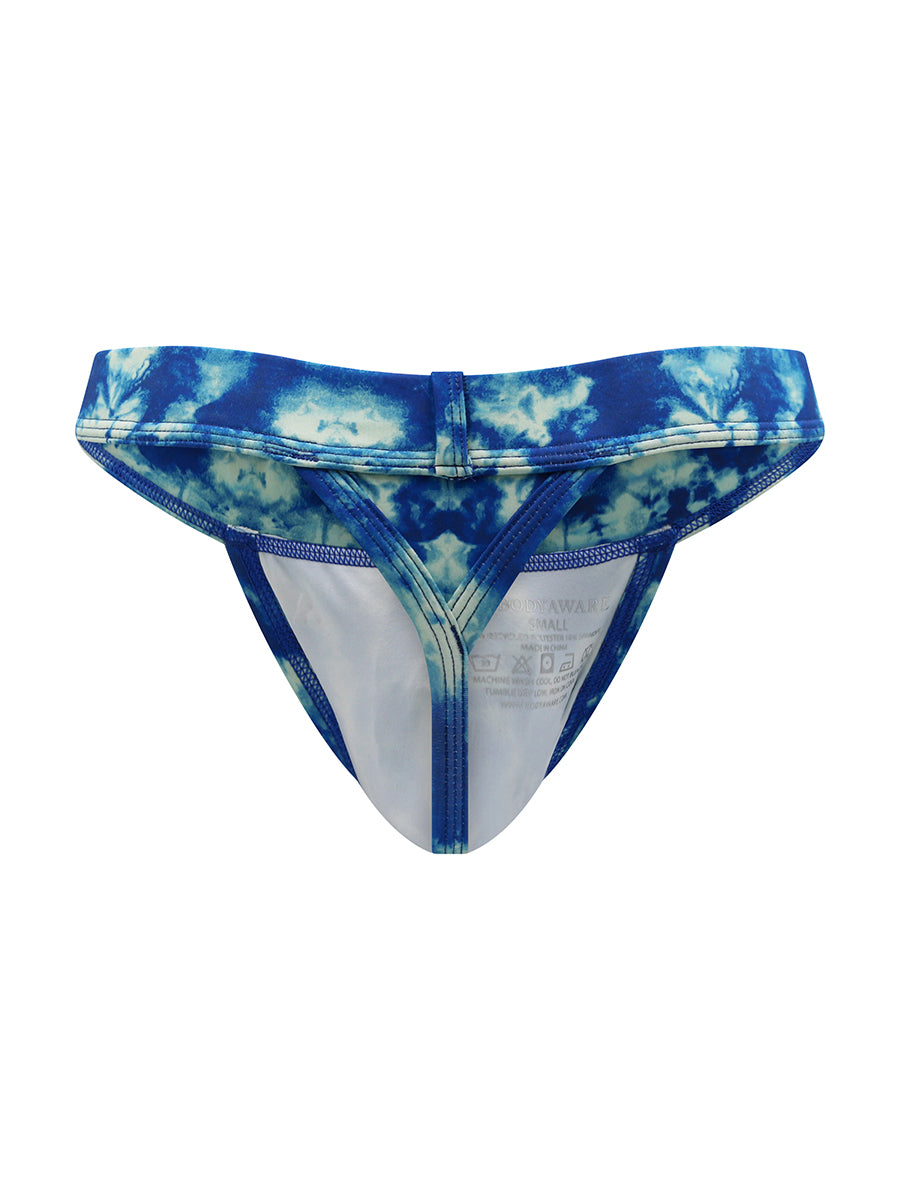 Back view of a blue and white tie dye swim thong on a white background.