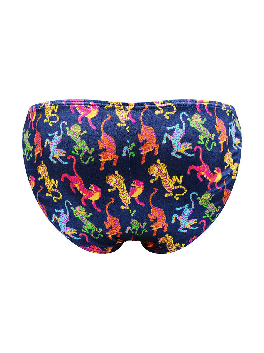 Back view of navy blue satin briefs with a colorful tiger print, against a white background.