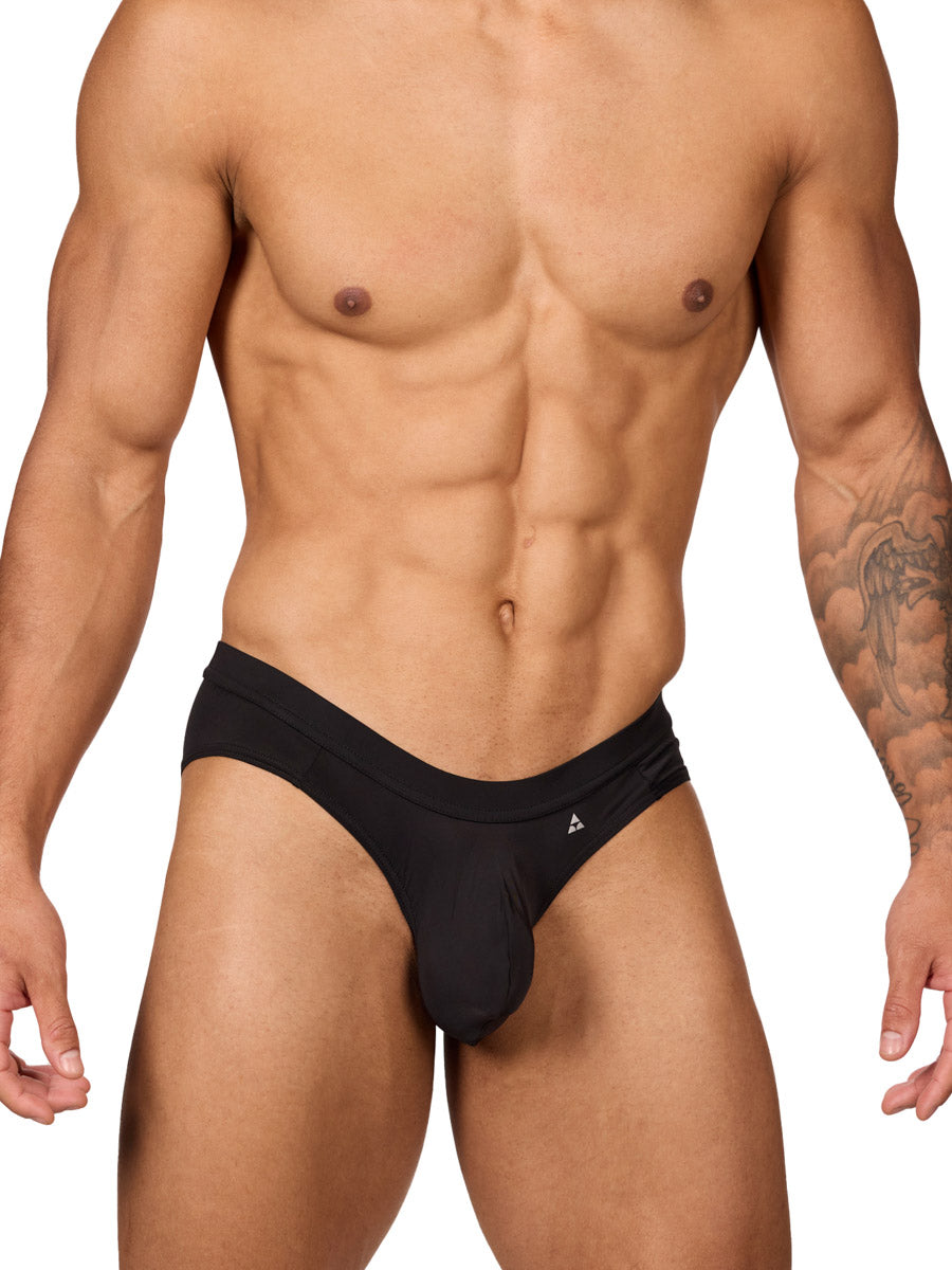 Front view of a muscular male model wearing black Body Aware briefs with matching waistband