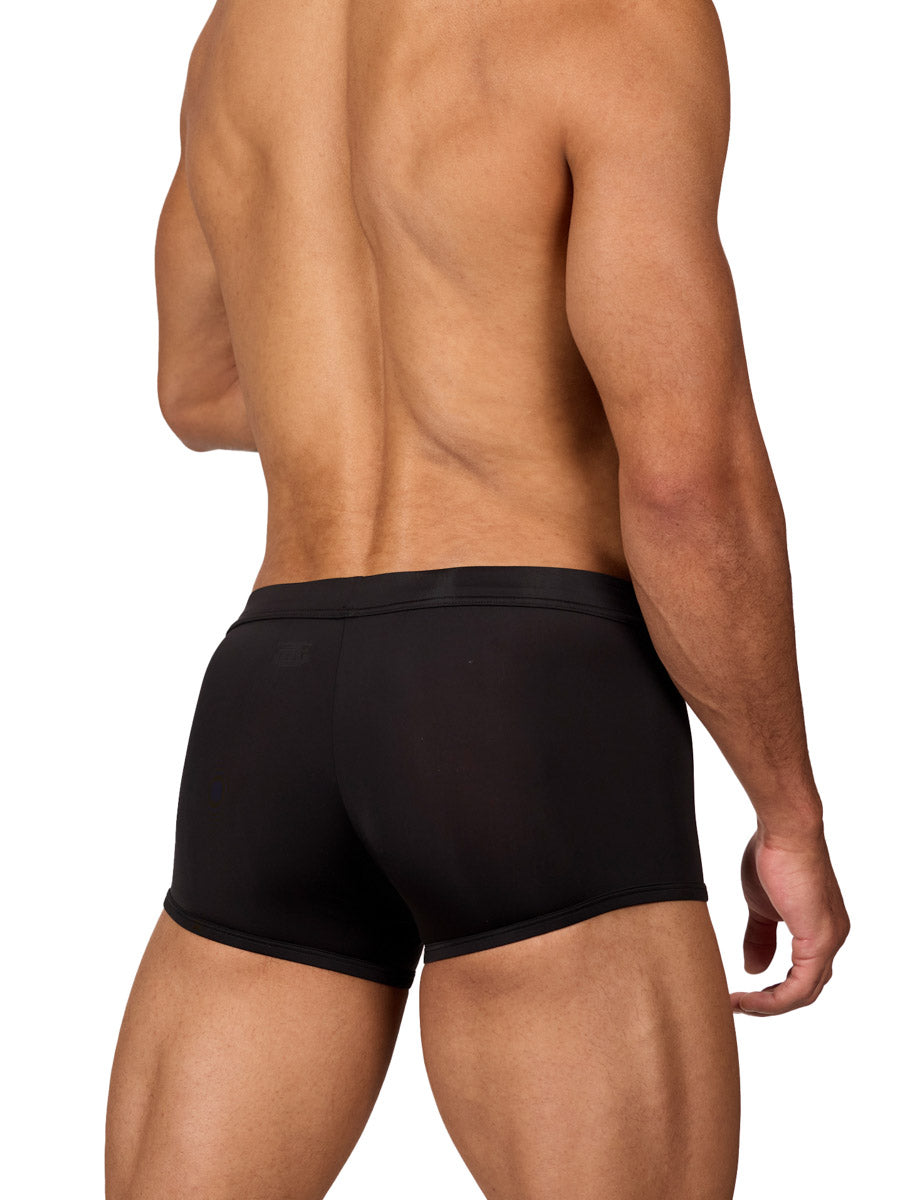 Back view of a muscular male model wearing black Body Aware boxer shorts