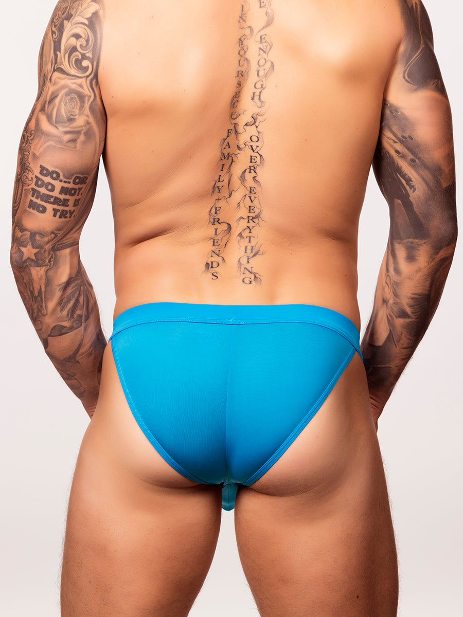 Back view of a man wearing a bright blue Body Aware glow sport tanga