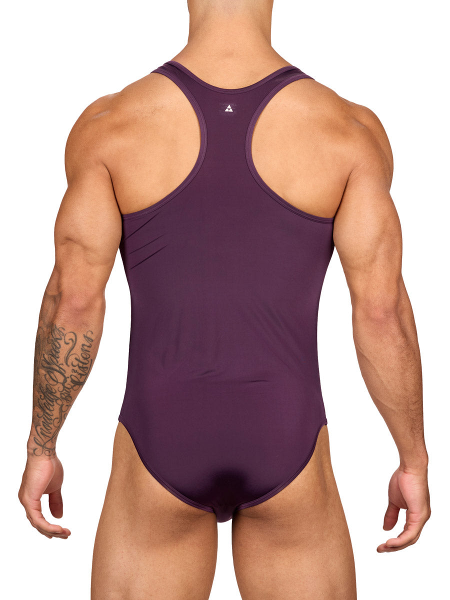 Back view of a muscular male model wearing a purple Body Aware brief bodysuit