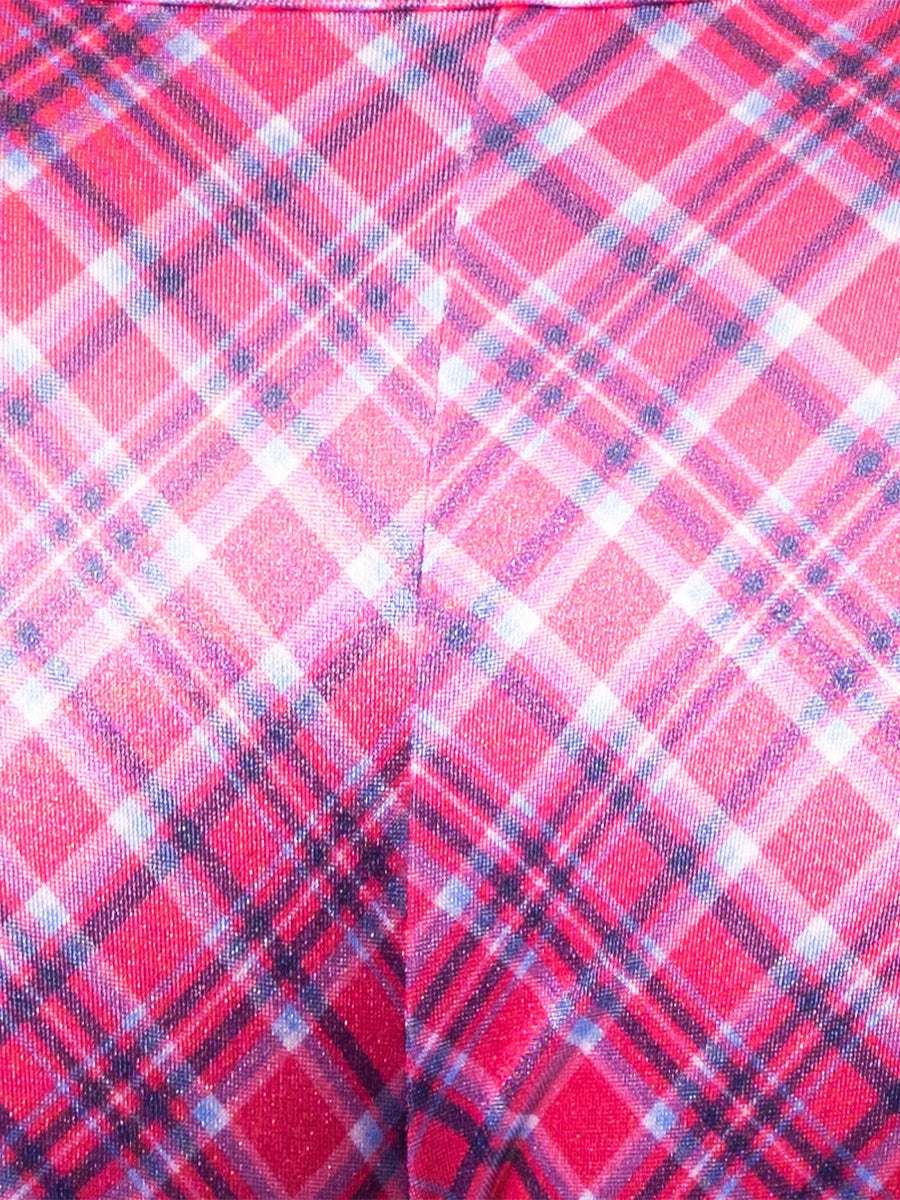 Closeup view of pink satin fabric with plaid pattern