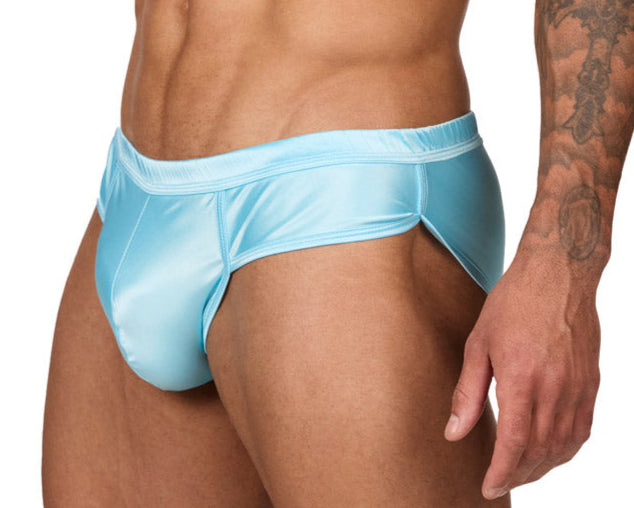 Side view of a male model wearing a Body Aware sky blue men's brief