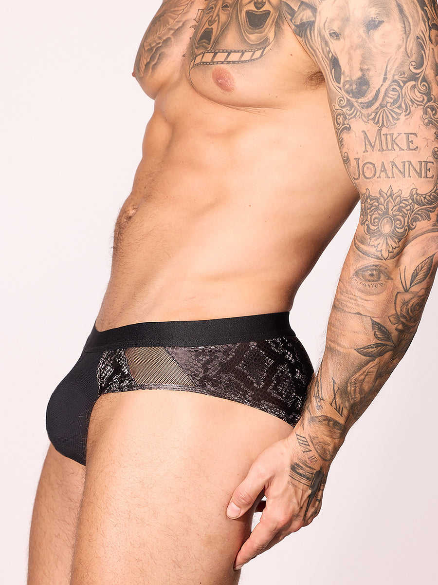 side view of men's nylon and mesh brief. It has mesh side panels and there is a white background Body Aware